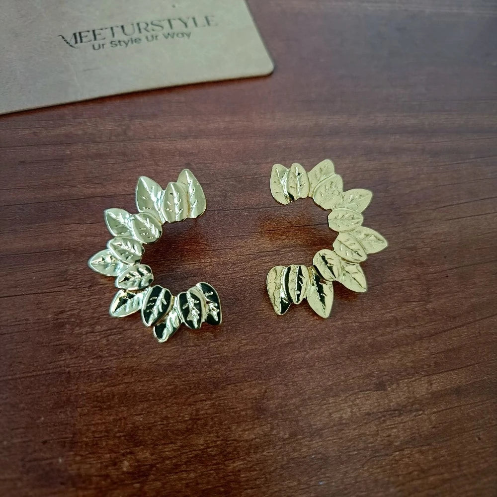 Ivy Curve gold leaf earrings by Meeturstyle