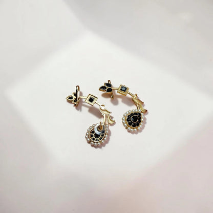 Kajal Earcuff with black stones, pearls and gold leaf detailing 2