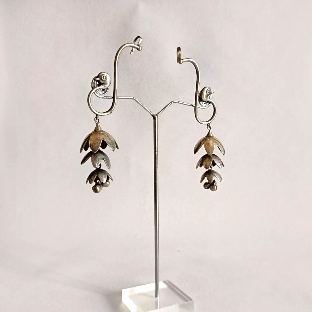 Mayurika silver peacock earcuff with 3-layer jhumka and ghunghroo detailing