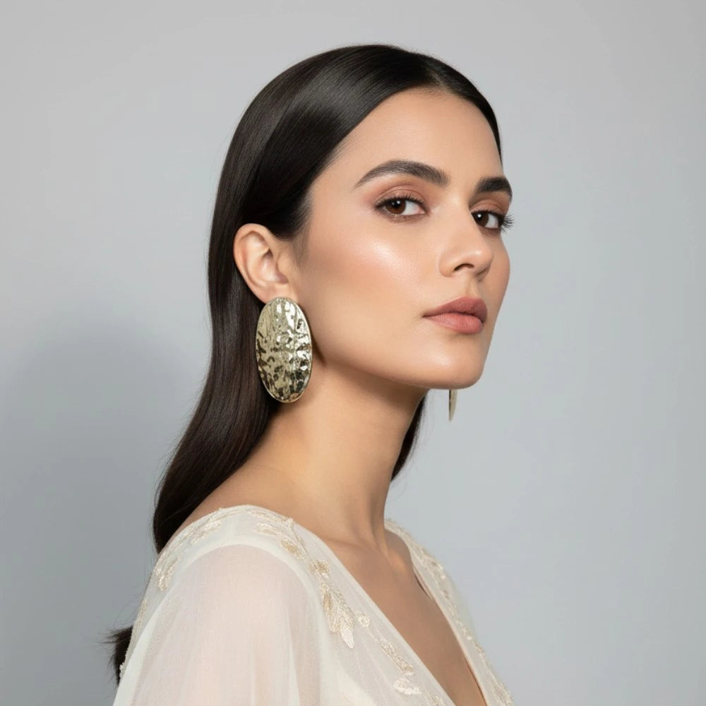 Mira Oval Studs gold textured anti-tarnish earrings – Meeturstyle model shoot