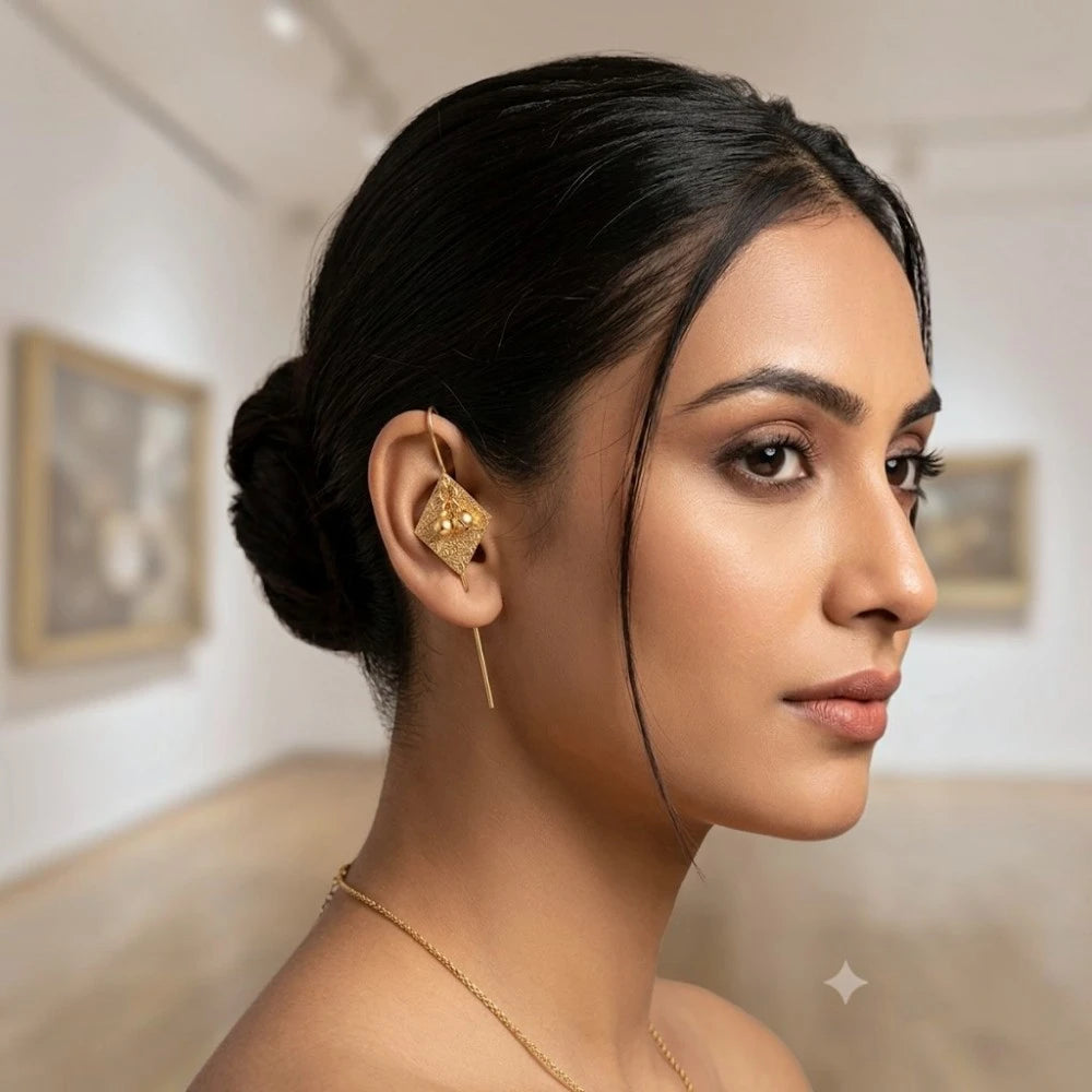 Reva lightweight gold earcuff styled on model